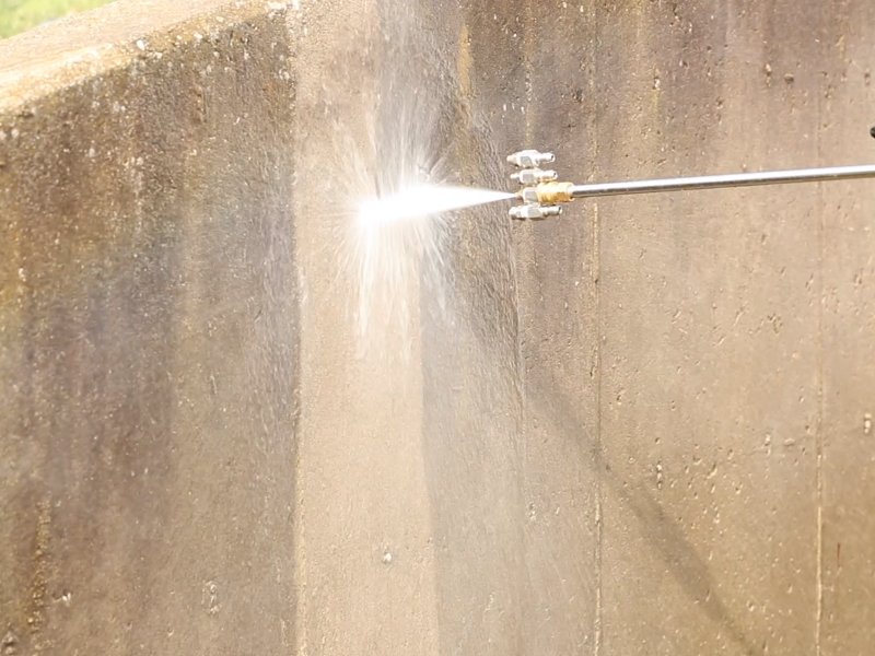 professional pressure washing concrete wall